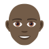 👨🏿‍🦲 man: dark skin tone, bald display on JoyPixels